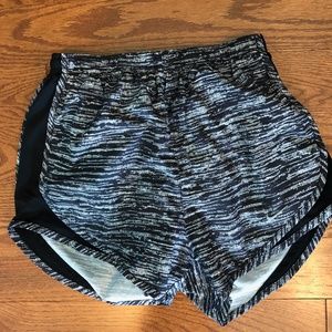 Black and white Nike running shorts